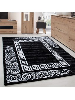 Modern black rug with a...