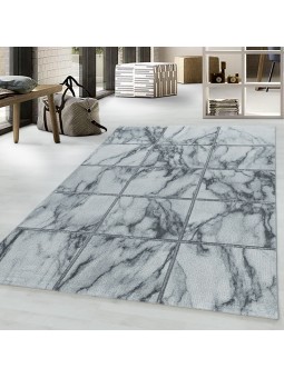 Tapis design a poil ras...