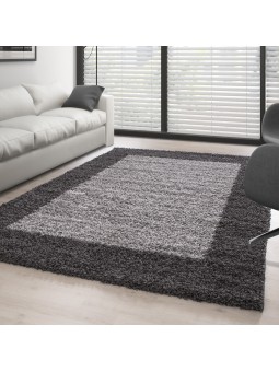 Alfombra peluda gris con...